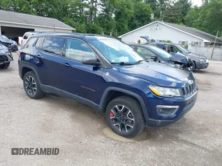 2021 Jeep Compass Trailhawk with VIN 3C4NJDDB0MT590442, listed as a IAAI auction lot 42543530 with 66,669 mi miles and . Bid and sale history available at DreamBid. Image 1.