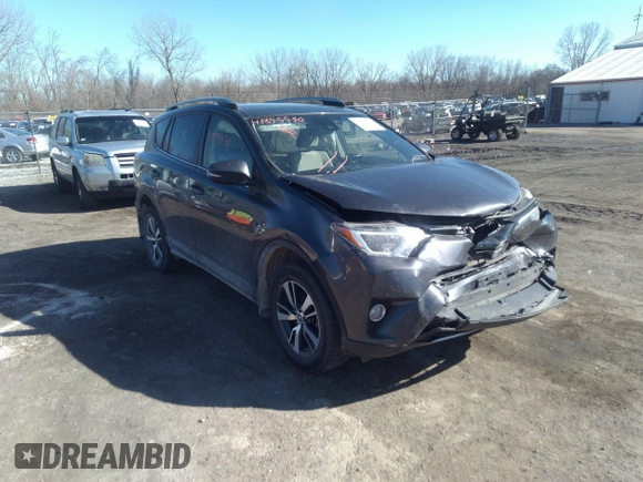 2018 Toyota RAV4 XLE with VIN JTMRFREV9JJ742276, listed as a IAAI auction lot 41855530 with 115,815 mi miles. Bid and sale history available at carsss.com. Image 1.
