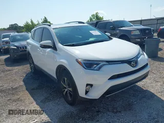 2018 Toyota RAV4 XLE with VIN JTMWFREV7JJ735295, listed as a IAAI auction lot 42452894 with 103,974 mi miles and . Bid and sale history available at DreamBid. Image 1.