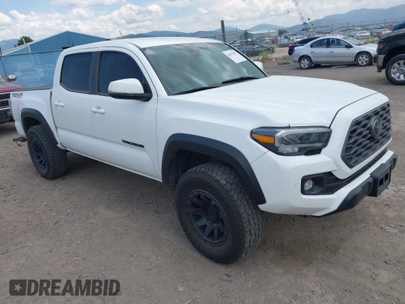 2022 Toyota Tacoma SR with VIN 3TMCZ5AN1NM478457, listed as a IAAI auction lot 42479107 with 59,547 mi miles and . Bid and sale history available at DreamBid. Image 1.