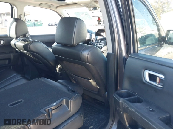 2015 Honda Pilot EX-L with VIN 5FNYF4H59FB060023, listed as a IAAI auction lot 41327793 with 197,981 mi miles and . Bid and sale history available at carsss.com. Image 8.