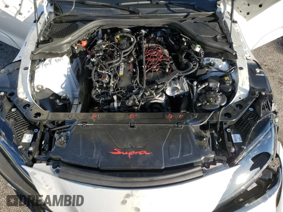 2021 Toyota Supra 3.0 z VIN WZ1DB0C08MW045912, wystawiony jako Copart lot #49248065 z przebiegiem Nie podano mil oraz Nie do naprawy • Non repairable. Historia ofert i sprzedaży dostępna na DreamBid. Obrazek 12.