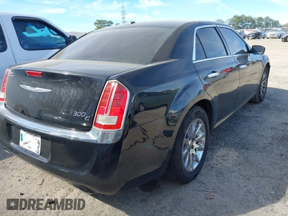 2014 Chrysler 300 with VIN 2C3CCAEG5EH365362, listed as a IAAI auction lot 41835374 with 223,751 mi miles. Bid and sale history available at carsss.com. Image 4.
