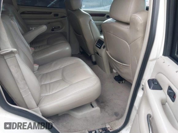 2003 Cadillac Escalade z VIN 1GYEK63N53R304400, wystawiony jako IAAI lot #41544697 z przebiegiem 207 913 mil mil oraz . Historia ofert i sprzedaży dostępna na DreamBid. Obrazek 8.