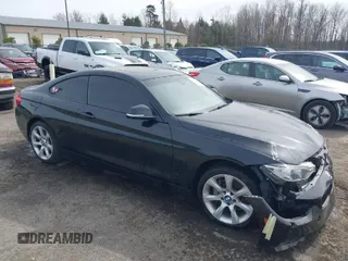 2014 BMW 4 Series 435i xDrive with VIN WBA3R5C54EK188957, listed as a IAAI auction lot 41790183 with 97,981 mi miles and . Bid and sale history available at carsss.com. Image 1.