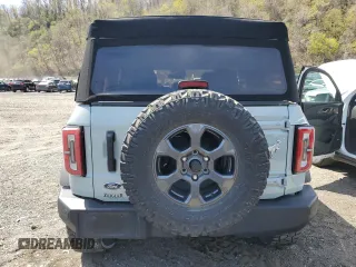 2021 Ford Bronco with VIN 1FMDE5BH0MLA87532, listed as a Copart auction lot 54229225 with 35,741 mi miles and Salvage title. Bid and sale history available at DreamBid. Image 6.