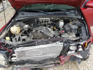 2008 Ford Escape Limited z VIN 1FMCU94108KA14209, wystawiony jako Copart lot #57857305 z przebiegiem 186 893 mil mil oraz Szkoda całkowita • Salvage title. Historia ofert i sprzedaży dostępna na DreamBid. Obrazek 12.
