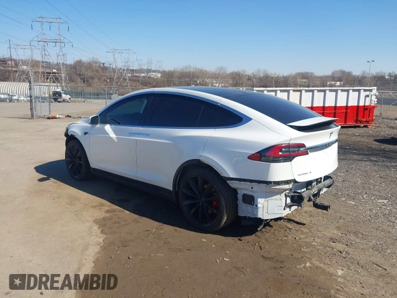 2018 Tesla Model X 75D with VIN 5YJXCAE45JF103828, listed as a IAAI auction lot 41698708 with 118,699 mi miles and . Bid and sale history available at carsss.com. Image 3.