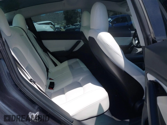 2020 Tesla Model 3 Standard Range Plus with VIN 5YJ3E1EAXLF615781, listed as a IAAI auction lot 42068935 with 96,026 mi miles. Bid and sale history available at carsss.com. Image 8.