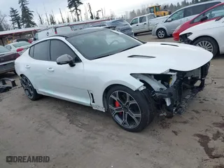 2021 Kia Stinger GT2 with VIN KNAE55LC5M6097982, listed as a IAAI auction lot 41568157 with 57,836 mi miles. Bid and sale history available at carsss.com. Image 1.