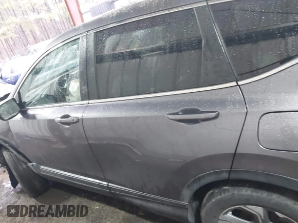 2018 Honda CR-V EX with VIN 7FARW2H56JE043542, listed as a IAAI auction lot 41560270 with 104,237 mi miles and . Bid and sale history available at DreamBid. Image 13.