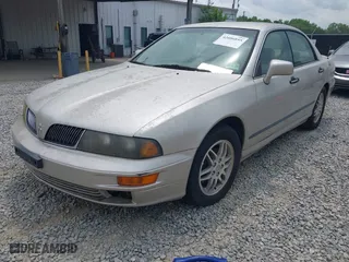 2002 Mitsubishi Diamante LS with VIN 6MMAP57P52T010479, listed as a IAAI auction lot 42086895 with 89,977 mi miles. Bid and sale history available at carsss.com. Image 2.
