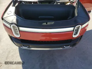 2024 Rivian R1T Adventure z VIN 7FCTGCAA3RN030346, wystawiony jako Copart lot #49440515 z przebiegiem 12 772 mil mil oraz Szkoda całkowita • Salvage title. Historia ofert i sprzedaży dostępna na DreamBid. Obrazek 11.