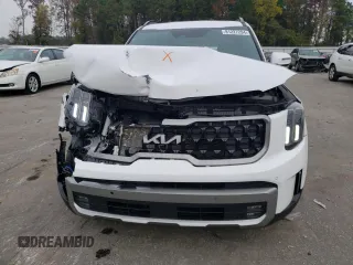 2023 Kia Telluride SX X-Line z VIN 5XYP5DGC9PG404586, wystawiony jako Copart lot #81227294 z przebiegiem 22 581 mil mil oraz Szkoda całkowita • Salvage title. Historia ofert i sprzedaży dostępna na DreamBid. Obrazek 5.