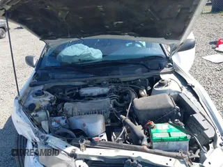 1999 Toyota Camry LE z VIN 4T1BG22K0XU862535, wystawiony jako IAAI lot #42116856 z przebiegiem 186 094 mil mil oraz . Historia ofert i sprzedaży dostępna na DreamBid. Obrazek 10.