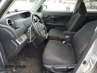 2009 Scion xB z VIN JTLKE50E591067708, wystawiony jako Copart lot #56297005 z przebiegiem 206 638 mil mil oraz Szkoda całkowita • Salvage title. Historia ofert i sprzedaży dostępna na DreamBid. Obrazek 7.