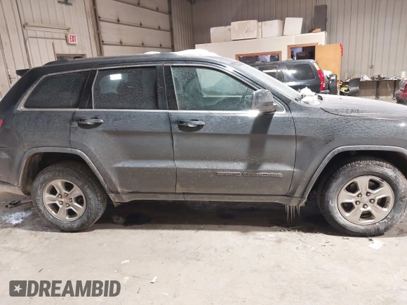 2017 Jeep Grand Cherokee Laredo with VIN 1C4RJFAG6HC661836, listed as a IAAI auction lot 41622814 with 134,509 mi miles. Bid and sale history available at carsss.com. Image 13.