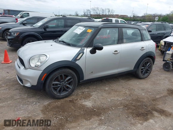 2011 MINI Countryman S with VIN WMWZC5C51BWM10385, listed as a IAAI auction lot 41952679 with 112,008 mi miles and . Bid and sale history available at DreamBid. Image 2.