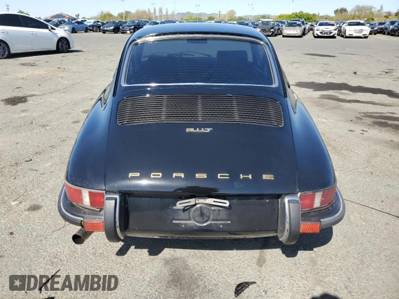 1971 Porsche 911 with VIN 9111120590, listed as a Copart auction lot 52559665 with 44,582 mi miles and Salvage title. Bid and sale history available at DreamBid. Image 6.