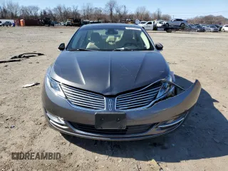 2015 Lincoln MKZ z VIN 3LN6L2JK1FR604092, wystawiony jako Copart lot #48379525 z przebiegiem 64 656 mil mil oraz Szkoda całkowita • Salvage title. Historia ofert i sprzedaży dostępna na DreamBid. Obrazek 5.
