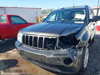 2006 Jeep Grand Cherokee Laredo with VIN 1J4GR48K56C326847, listed as a IAAI auction lot 41972623 with 141,088 mi miles. Bid and sale history available at carsss.com. Image 6.
