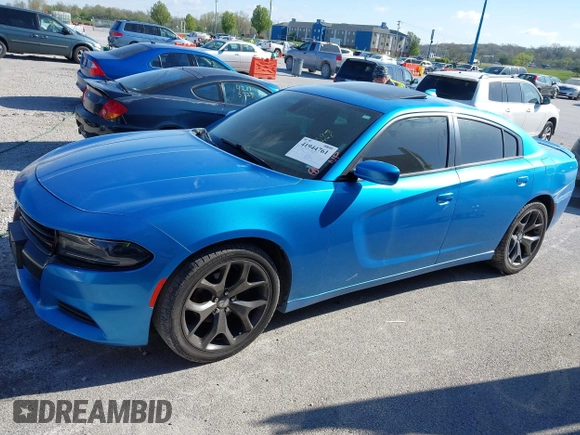 2015 Dodge Charger SXT with VIN 2C3CDXHG1FH866598, listed as a IAAI auction lot 41944761 with 201,163 mi miles and . Bid and sale history available at DreamBid. Image 14.