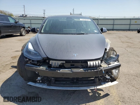 2023 Tesla Model 3 Long Range with VIN 5YJ3E1EB2PF389041, listed as a Copart auction lot 53450725 with 27,060 mi miles and Salvage Title. Bid and sale history available at DreamBid. Image 5.