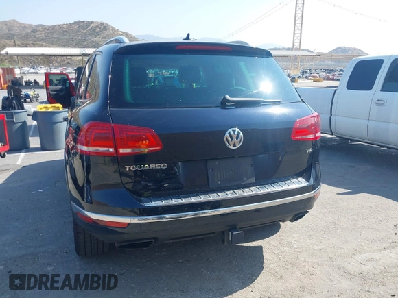 2016 Volkswagen Touareg Sport with VIN WVGEF9BP7GD010252, listed as a IAAI auction lot 42465165 with Not provided miles and . Bid and sale history available at DreamBid. Image 17.