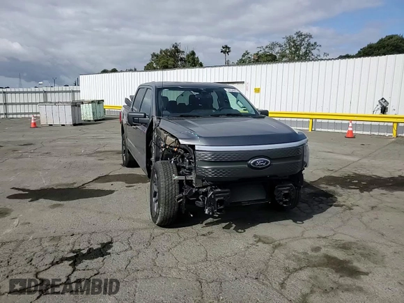 2023 Ford F-150 Lightning Pro with VIN 1FT6W1EV0PWG34788, listed as a Copart auction lot 54454805 with 11,432 mi miles and Salvage title. Bid and sale history available at DreamBid. Image 14.
