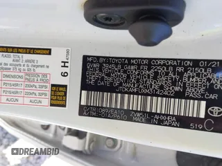 2021 Toyota Prius L Eco z VIN JTDKAMFUXM3142402, wystawiony jako IAAI lot #41665484 z przebiegiem 67 416 mil mil oraz . Historia ofert i sprzedaży dostępna na DreamBid. Obrazek 9.