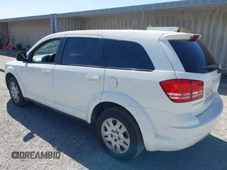 2014 Dodge Journey SE with VIN 3C4PDCAB4ET193896, listed as a IAAI auction lot 42126565 with 242,108 mi miles and . Bid and sale history available at carsss.com. Image 3.