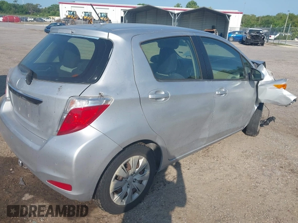2013 Toyota Yaris L with VIN JTDKTUD30DD548977, listed as a IAAI auction lot 42187750 with 213,377 mi miles and . Bid and sale history available at DreamBid. Image 4.