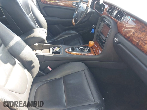 2004 Jaguar XJ with VIN SAJEA71C94SG01362, listed as a IAAI auction lot 41829470 with 172,545 mi miles. Bid and sale history available at carsss.com. Image 5.