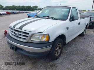 1999 Ford F-150 with VIN 1FTRF17W4XNC25668, listed as a IAAI auction lot 42731954 with 189,437 mi miles and . Bid and sale history available at DreamBid. Image 2.