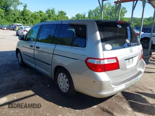 2005 Honda Odyssey LX z VIN 5FNRL38275B117069, wystawiony jako IAAI lot #42232470 z przebiegiem 265 180 mil mil oraz . Historia ofert i sprzedaży dostępna na DreamBid. Obrazek 3.