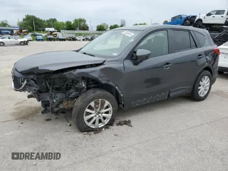 2014 Mazda CX-5 Touring z VIN JM3KE4CY2E0368729, wystawiony jako Copart lot #55563645 z przebiegiem 204 521 mil mil oraz Szkody całkowita. Historia ofert i sprzedaży dostępna na DreamBid. Obrazek 1.