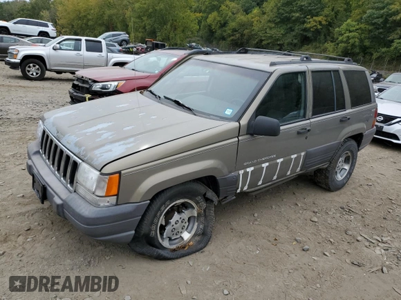 1996 Jeep Grand Cherokee Laredo with VIN 1J4GZ58S7TC403946, listed as a Copart auction lot 71785734 with 231,780 mi miles and Salvage Title. Bid and sale history available at carsss.com. Image 1.