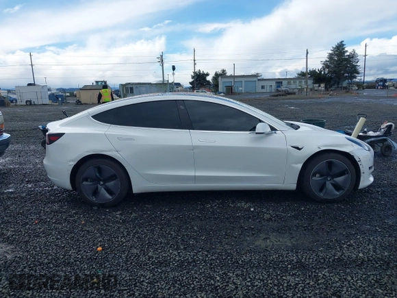 2018 Tesla Model 3 Long Range Battery with VIN 5YJ3E1EA3JF013253, listed as a IAAI auction lot 41752102 with 84,459 mi miles. Bid and sale history available at carsss.com. Image 13.