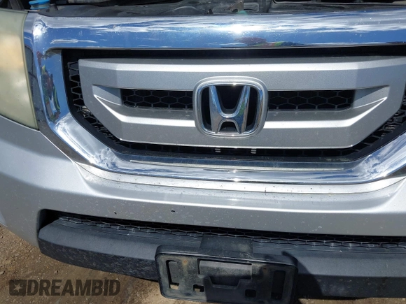 2009 Honda Pilot Touring with VIN 5FNYF48969B018075, listed as a IAAI auction lot 42052333 with 206,700 mi miles and . Bid and sale history available at carsss.com. Image 6.