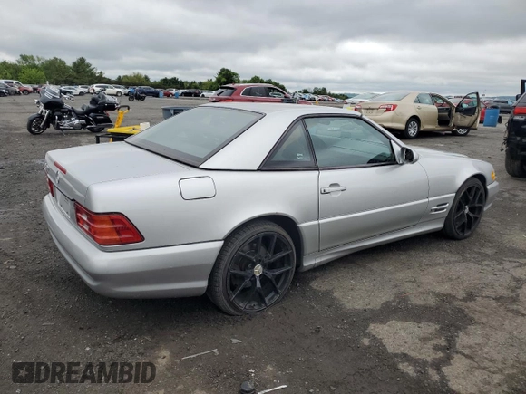 1999 Mercedes-Benz SL 500 with VIN WDBFA68F1XF177603, listed as a Copart auction lot 58983485 with 120,737 mi miles and Salvage title. Bid and sale history available at DreamBid. Image 3.