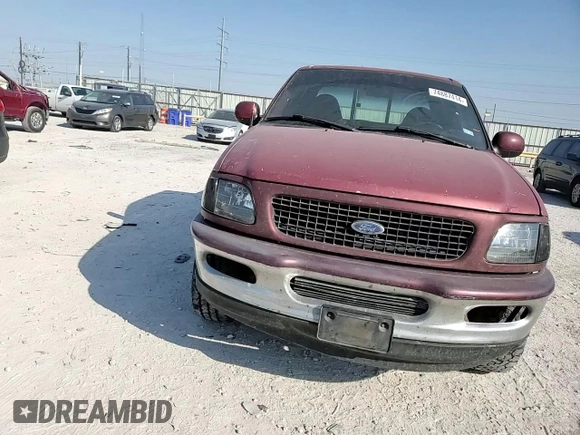 1997 Ford F-150 XL with VIN 1FTDX0721VKC14947, listed as a Copart auction lot 74887414 with 157,811 mi miles and Salvage title. Bid and sale history available at DreamBid. Image 10.