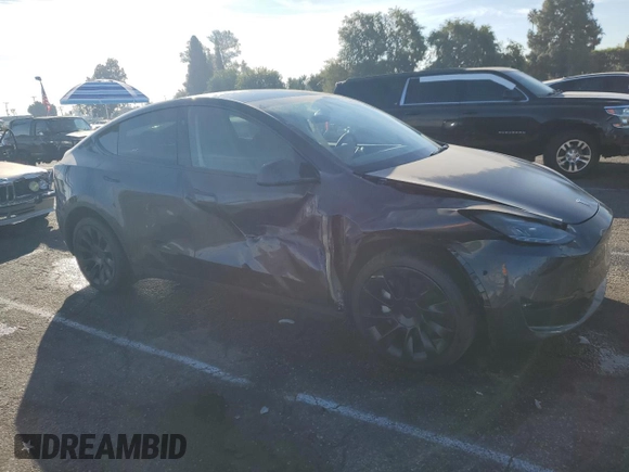 2024 Tesla Model Y Long Range с VIN 7SAYGDEE3RA236473, выставлен на аукционе Copart как лот 77409334 с пробегом 5 822 миль миль и Списание • Salvage title. История ставок и продаж доступна на DreamBid. Изображение 4.