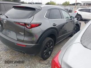 2024 Mazda CX-30 Premium Plus with VIN 3MVDMBEY1RM720111, listed as a IAAI auction lot 42730412 with 3,988 mi miles and . Bid and sale history available at DreamBid. Image 4.