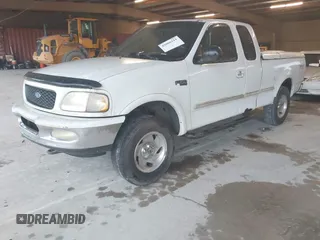 1997 Ford F-150 XL with VIN 1FTDX1861VNA65140, listed as a IAAI auction lot 42086211 with 412,065 mi miles. Bid and sale history available at carsss.com. Image 2.