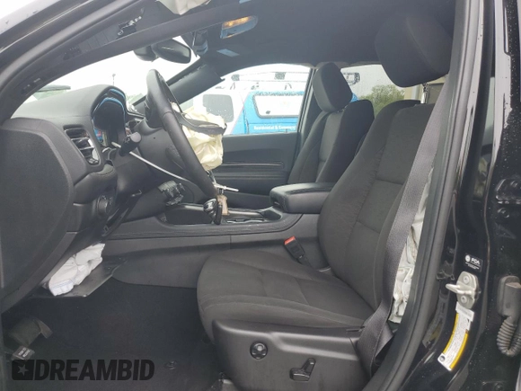 2023 Dodge Durango SXT with VIN 1C4RDHAG5PC634936, listed as a Copart auction lot 57282195 with 56,689 mi miles and Salvage title. Bid and sale history available at DreamBid. Image 7.