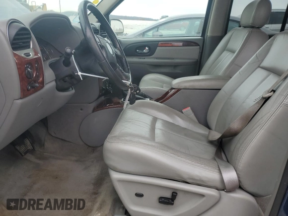 2006 GMC Envoy SLE with VIN 1GKDT13S662261761, listed as a Copart auction lot 43813415 with 206,745 mi miles and Clean Title. Bid and sale history available at carsss.com. Image 7.