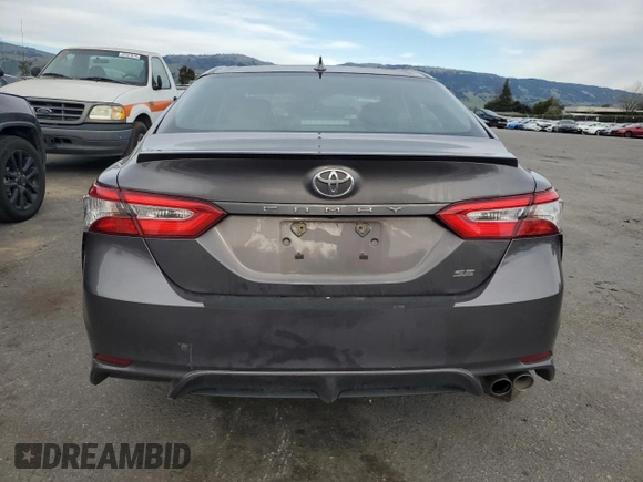 2019 Toyota Camry LE with VIN 4T1B11HK7KU248125, listed as a Copart auction lot 46953005 with 71,420 mi miles and Salvage Title. Bid and sale history available at carsss.com. Image 6.
