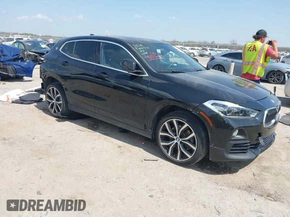 2018 BMW X2 xDrive28i with VIN WBXYJ5C33JEF80454, listed as a IAAI auction lot 41876188 with 34,596 mi miles. Bid and sale history available at carsss.com. Image 1.