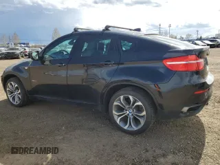 2012 BMW X6 50i z VIN 5UXFG8C59CLZ97450, wystawiony jako Copart lot #55281205 z przebiegiem 188 625 mil mil oraz Czysty tytuł • Clean title. Historia ofert i sprzedaży dostępna na DreamBid. Obrazek 2.