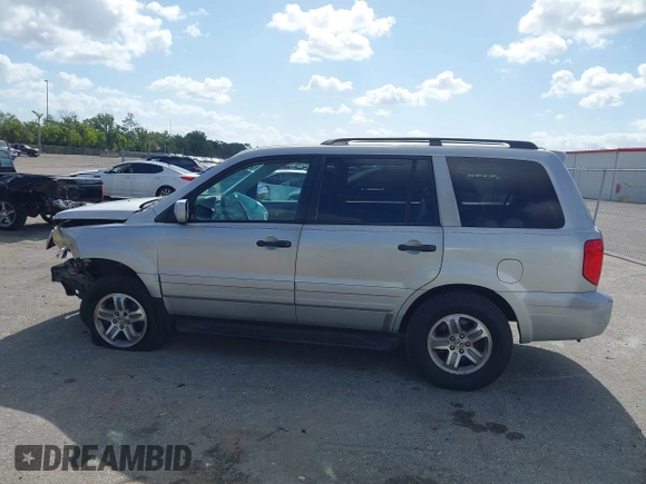 2003 Honda Pilot EX with VIN 2HKYF18603H504829, listed as a IAAI auction lot 42083247 with 247,429 mi miles and . Bid and sale history available at carsss.com. Image 14.